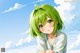 Anime girl with green hair sitting in front of a blue sky.