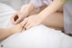 A woman getting a foot massage at a spa.